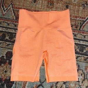 orange biker shorts